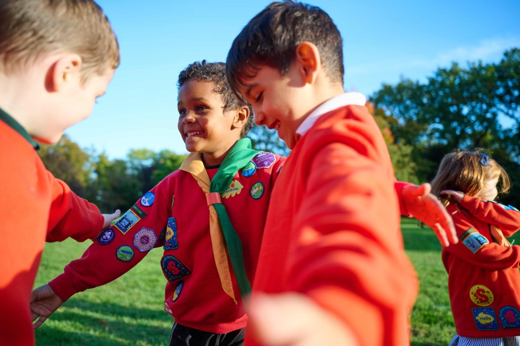 photograph,  Early Years,  Mixed Genders,  Outdoors,  Squirrels,  fun,  smiling,  Ball,  Boy,  Human,  People,  Person,  Sphere,  Sport,  Sports,  Team,  Team Sport